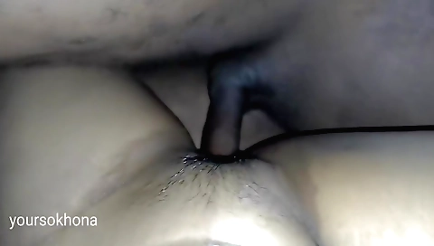 Indian girl with a shaved pussy has fun in a big dildo