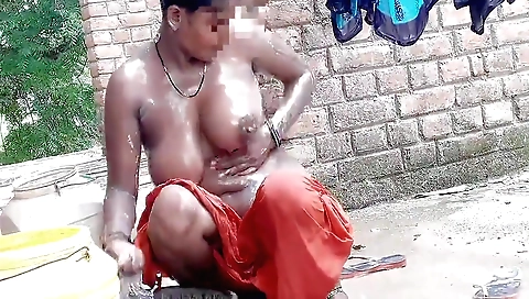 A brunette has a solo workout on her back of the shower room