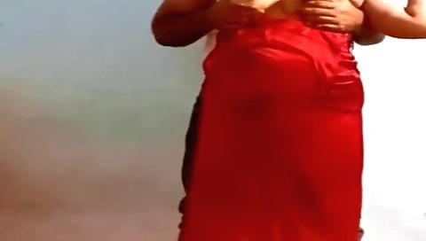 Indian brunette with a sexy ass is giving a hot handjob