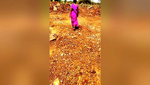 Indian brunette walks in the forest and takes off her clothes