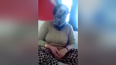 Amateur brunette milf fucks herself in webcam video