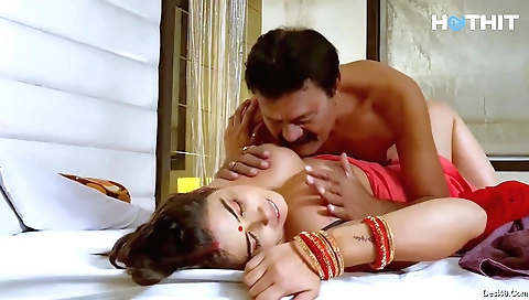 Sexy brunette milf shows off her huge tits in a hd clip