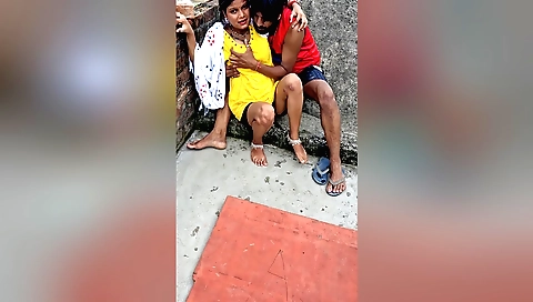 Indian brunette teen girl in a bikini rides a pe in the desert