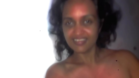 Indian slut with large tits rides her own dick solo