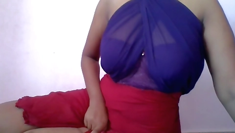 Busty Indian slut takes off her sexy dress and makes a solo clip
