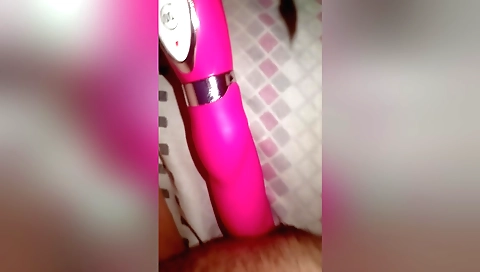 Sexy solo female with a vibrator in her hairy pussy