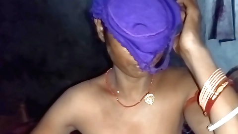 Indian girl in red dress and a black dildo on her body