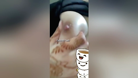 Solo amateur video on which a busty girl makes noises