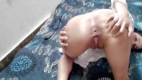 Indian amateur teen wearing a dress fucked on the bed