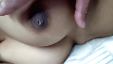 Indian milf with a shaved pussy showing her breasts