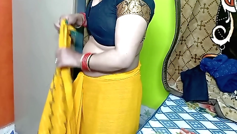 Indian girl in a yellow color sari in an amateur video