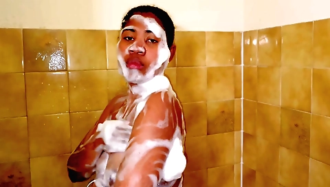 Busty ebony teen with big tits and sexy body is showering