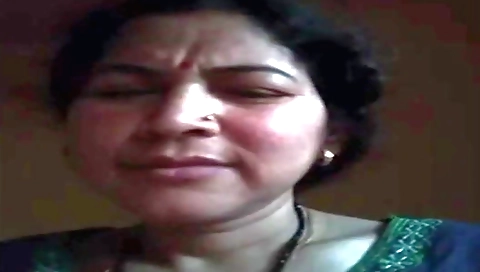 Amateur video with a brunette with big hairy breasts