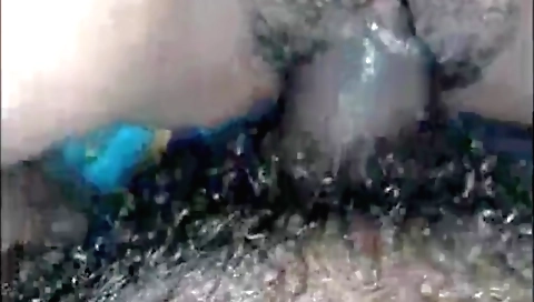 Indian hairy woman with tanned skin shows her hairy pussy