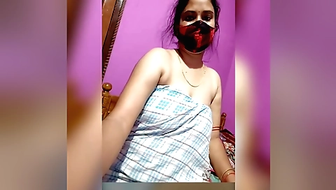 Indian girl in a white dress fucks her pussy in webcam