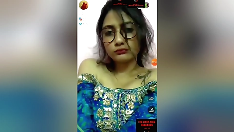 Busty brunette in white stockings takes off on webcam