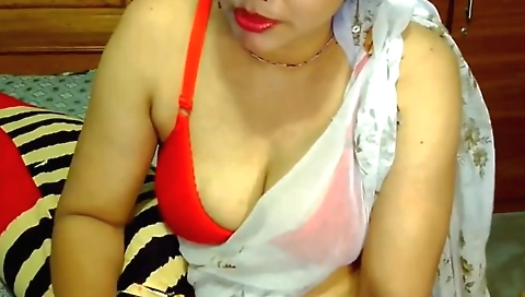 Huge indian brunette beauty is enjoying a dick in her pussy
