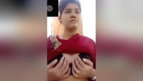 Sexy brunette in a black bikini shows her cute ass on webcam