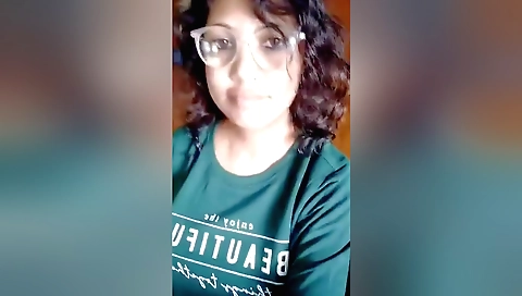 Sexy brunette Indian chick in red dress change her top