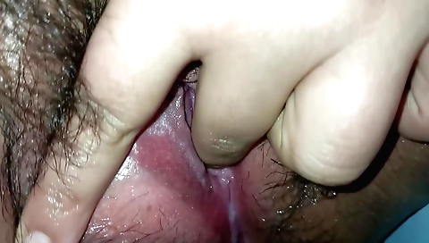 Indian hairy pussy is getting fucked in the shower