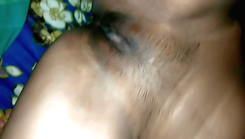 Indian girl gets fucked by a dildo in a hairy pussy