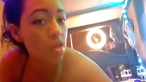 Hot brunette babe with big natural boobs is in her room