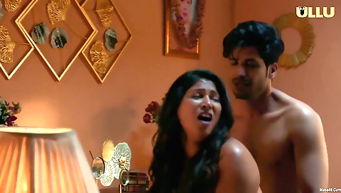 Brunette milf in the bed with her natural boobs on