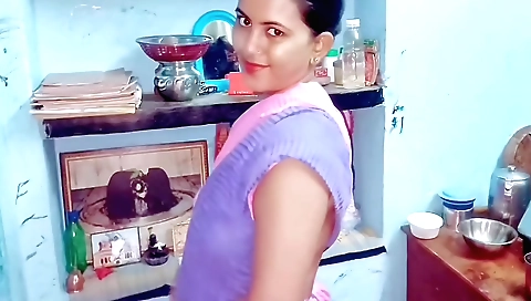 Indian brunette takes a shower and sits in a bed alone