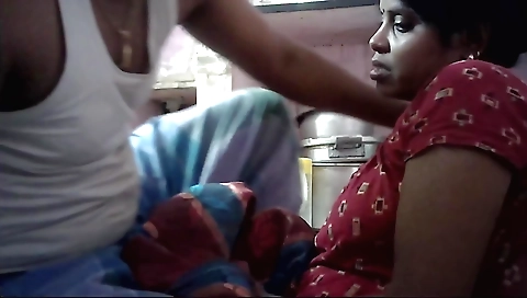 Amateur brunette in a dress takes a peek at herself