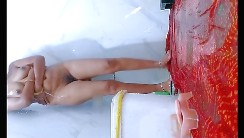 Amateur indian woman plays with hair in the shower