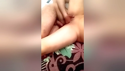 Black bikini girl in front of a desk and bare feet